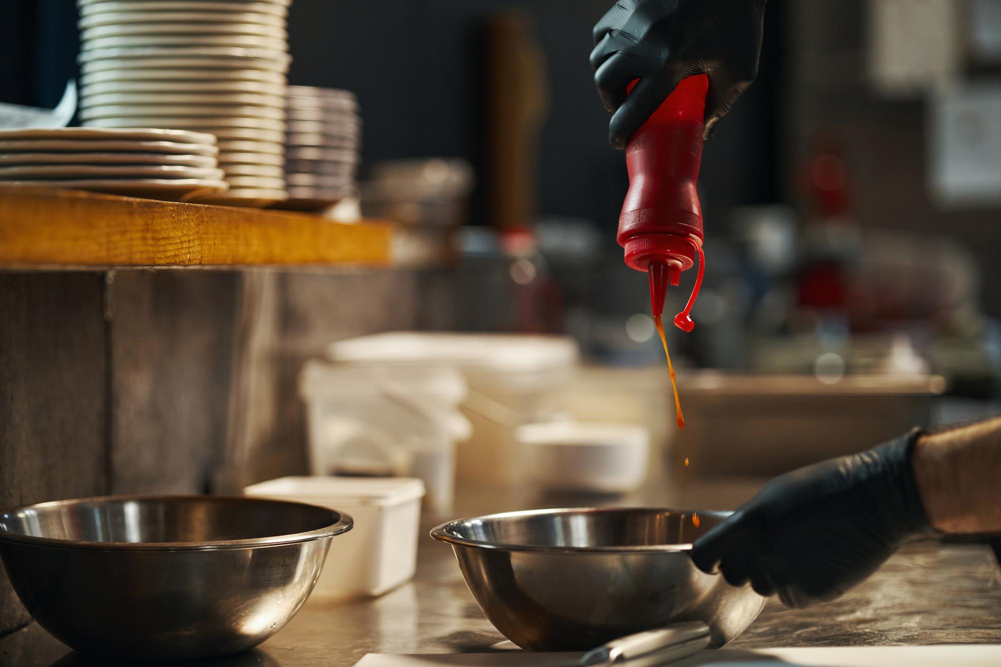 Chef preparing sauces in the kitchen